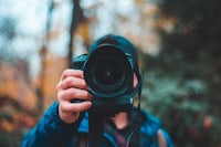 a person taking a photo with a camera