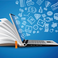 a laptop with a book open and icons on it