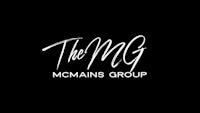 the mcmains group logo on a black background